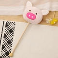 Pink plush pig massage hammer with natural wood handle on a geometric woven mat - 35cm (Massage Stick) / Pig