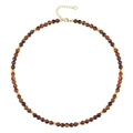 Detail of tiger eye bead necklace with gold lobster clasp and heart charm extension - Tiger Eye Necklace