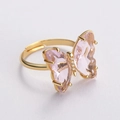 Adjustable gold plated ring featuring a faceted pink crystal butterfly with zircon body - Light Pink