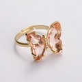 Adjustable gold butterfly ring with pink crystal wings and micro-pave cubic zirconia - Champagne