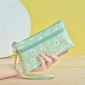 Mint green daisy pattern clutch bag with double zipper and hand strap for women - Seagrass Green