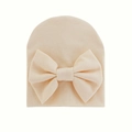 Cute beige ribbed cotton newborn hat with a large decorative bow for infants - 0-6 Months / Beige