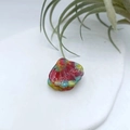 Mini shell-shaped hair claw clip with colorful marble resin patterns on white stone - Shell Rainbow 2.6cm