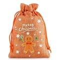 Detail of orange linen Christmas drawstring bag featuring gingerbread man and star prints - Linen Christmas Style 09; 9*12cm