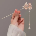 Classic Chinese hairpin with pink butterfly, enamel flowers, and long gold tassel - Hollow Butterfly Pink & White Sakura Tassel Style (4629)