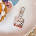 Cute Japanese style short hair girl acrylic keychain charm for bags and AirPods - Hugging Girl