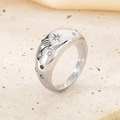 Macro view of wide stainless steel ring with colorful star engravings and round zircons - US 8 / Steel (KR111579-GC)
