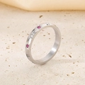 Macro view of silver star ring featuring pink and white pavé zircons on a stone base - US 7 / Steel (KR110120-K)