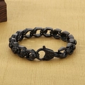 Pulsera punk de calavera para hombre en negro mate con eslabones robustos de acero titanio - Negro