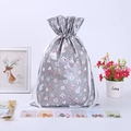 Silver Christmas gift bags with festive patterns, including gold ties and holiday cards - Grey Pattern 42*29