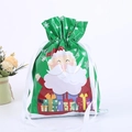 Christmas drawstring gift bag featuring Santa Claus print on a green foil background - Santa Claus Dark Green 24*32