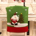 Christmas chair cover featuring 3D Santa skiing motif on festive green fabric - Skiing Santa Claus Style