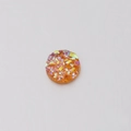Detailed view of 6mm orange resin rhinestone with shimmering iridescent crystal texture - 6mm / Orange Iridescent (10)
