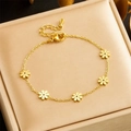 Elegante pulsera de margaritas de acero inoxidable chapado en oro con cierre de langosta - Pulsera de Margarita Dorada (B1382)