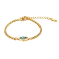 Dettaglio di bracciale in acciaio oro 18K con occhio di Allah turchese e pietre brillanti - Stile Malocchio (MS-551) / Bracciale Malocchio Oro