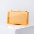 Elegant orange acrylic box clutch bag with gold metal frame and transparent finish - Transparent Orange