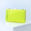 Neon yellow transparent acrylic box clutch with silver metal clasp and sleek design - Fluorescent Green