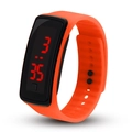 Close-up of vibrant orange LED digital watch with red time display on black dial - Orange