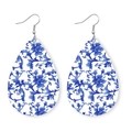 Ethnic teardrop earrings with blue and white porcelain pattern on a white background - Blue White Toile