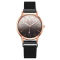 Women's quartz watch with rose gold case, lotus dial, and black magnetic mesh strap - Black
