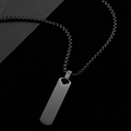Macro view of a sleek black stainless steel rectangular pendant necklace on a dark background - With 60cm Chain / 5.0mm Thickness / Black