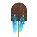 Detail of bohemian long feather tassel earrings with blue beads on wooden display stand - Sky Blue