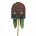 Detail of bohemian long green feather earrings with beads on a wooden display stand - Grass Green