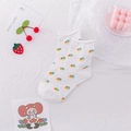 White cotton crew socks featuring cute orange carrot patterns and rolled cuffs for women - One Size / Carrot