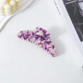 Detail of large crescent hair claw in purple marble acetate with elegant texture - Purple Floral