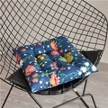 Detail of floral printed chair cushion with quilted 9-point positioning on black iron chair - 40x40cm / Blue Floral