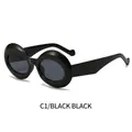 Gafas de sol ovales con montura gruesa negro brillante y lentes gris oscuro - Montura Negra Lentes Gris Negro