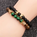 Set di bracciali con perline nere opache e occhio di tigre con ciondoli corona d'oro - Set Oro