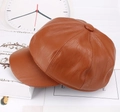 Detail view of brown octagonal newsboy cap with leather texture and top button detail - One Size 58cm / Yellow Leather Octagonal Hat