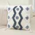 Bohemian tufted pillow cover in cream with blue fringe tassels on a cozy beige sofa - Style 7 (No Insert)