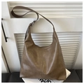 Brown leather moon-shaped hobo shoulder bag with an adjustable strap in urban style - Khaki
