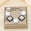 Vintage stainless steel bracelet with geometric black enamel and white crystal charms - Steel (KB187289-GC)