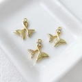 Detailed view of 14k gold-plated mermaid tail charms with sparkling zircons in a tray - 22# Mermaid Tail