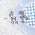 Macro detail of silver moon and star pendant with 13mm by 29.5mm dimensions - 9# Silver Milk White Moon Star