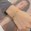 5203 Kreuzarmband Gold