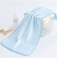 Light blue striped coral fleece towel with rounded edges for soft absorbent skin care - Blue