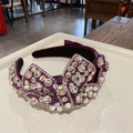 Luxurious purple knot headband with sparkling rhinestones and crystal bow details - Purple