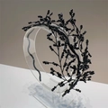 Detail of handmade black beaded headband with crystal texture and branch-like design - Black