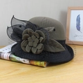 Detail of army green wool felt cloche hat with black mesh veil and floral feather accents - Adjustable / Army Green (Mesh Contrast Lotus)