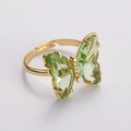 Adjustable gold butterfly ring featuring light green gemstones and micro-pave zircons - Green