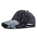 Retro newspaper print baseball cap in black cotton with vintage typography design - Black