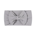 Soft grey nylon baby headband featuring a large bow and high elastic fabric - Light Gray