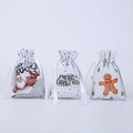 Tre sacchetti regalo natalizi con coulisse e motivi di Babbo Natale, renne e pan di zenzero - 50 pezzi / Bianco 3 Stili Misti
