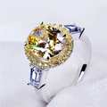 Luxury ring with round yellow zircon center stone and blue sapphire side stones on white fabric - US 10 / Tri-color (Gold/Silver/Rose Gold)