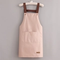 Pink waterproof apron with brown straps and dual front pockets for kitchen work - Basic Style / Smoky Pink
