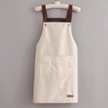 Minimalist beige waterproof apron with brown straps and dual front pockets for kitchen use - Basic Style / Beige